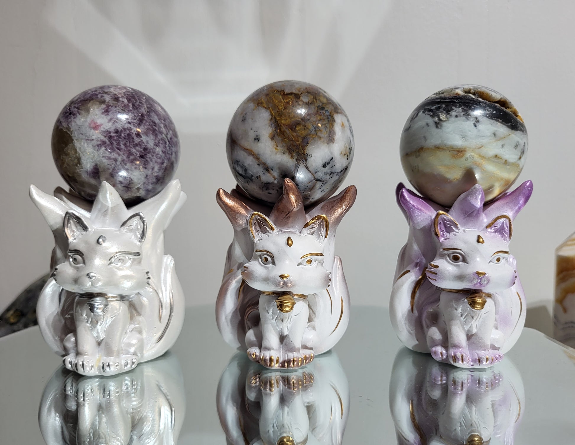White "9 Tail Fox" Sphere stands with option of silver, rose gold or purple accents